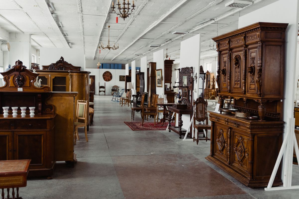 Antique furniture in an estate auction showroom